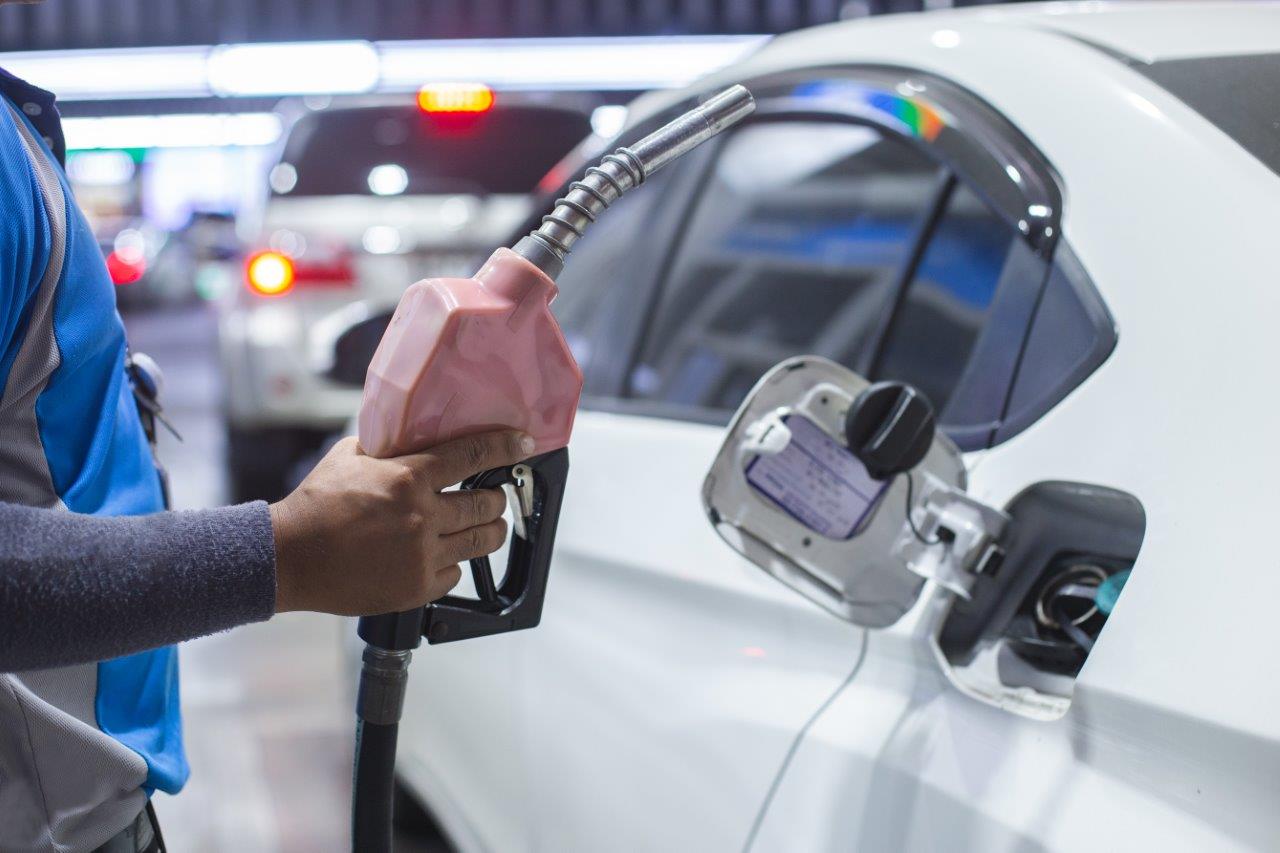 man holding gas pump