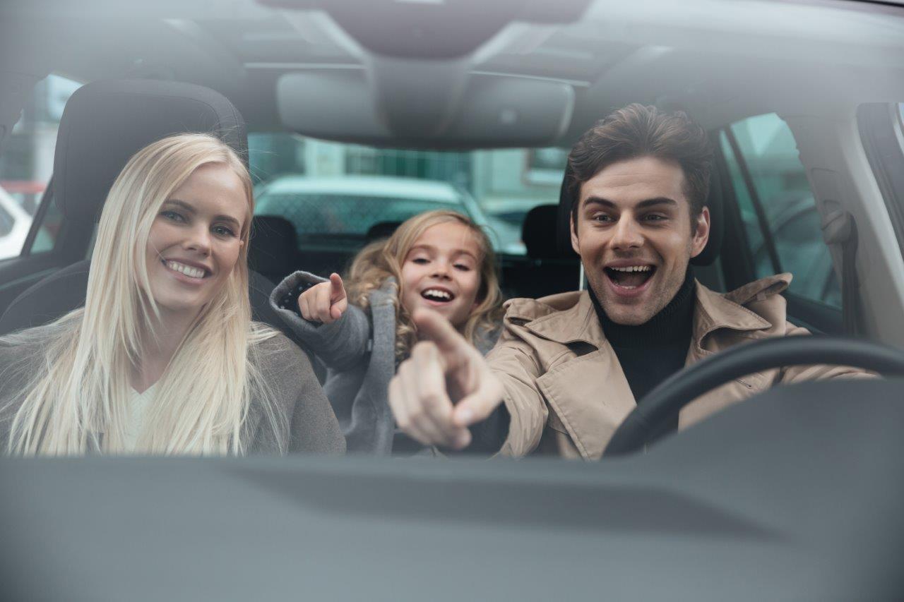 happy family in car