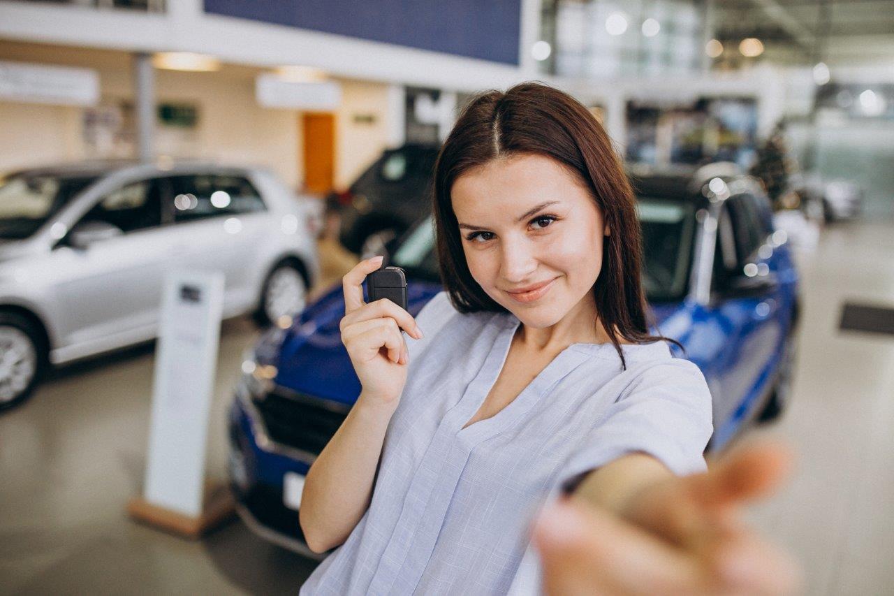 woman buying car